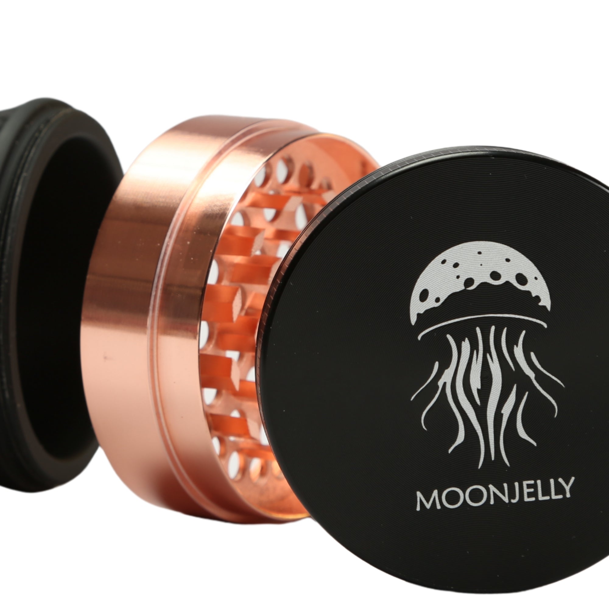 Rose Gold and black grinder with Moonjelly logo on a white background