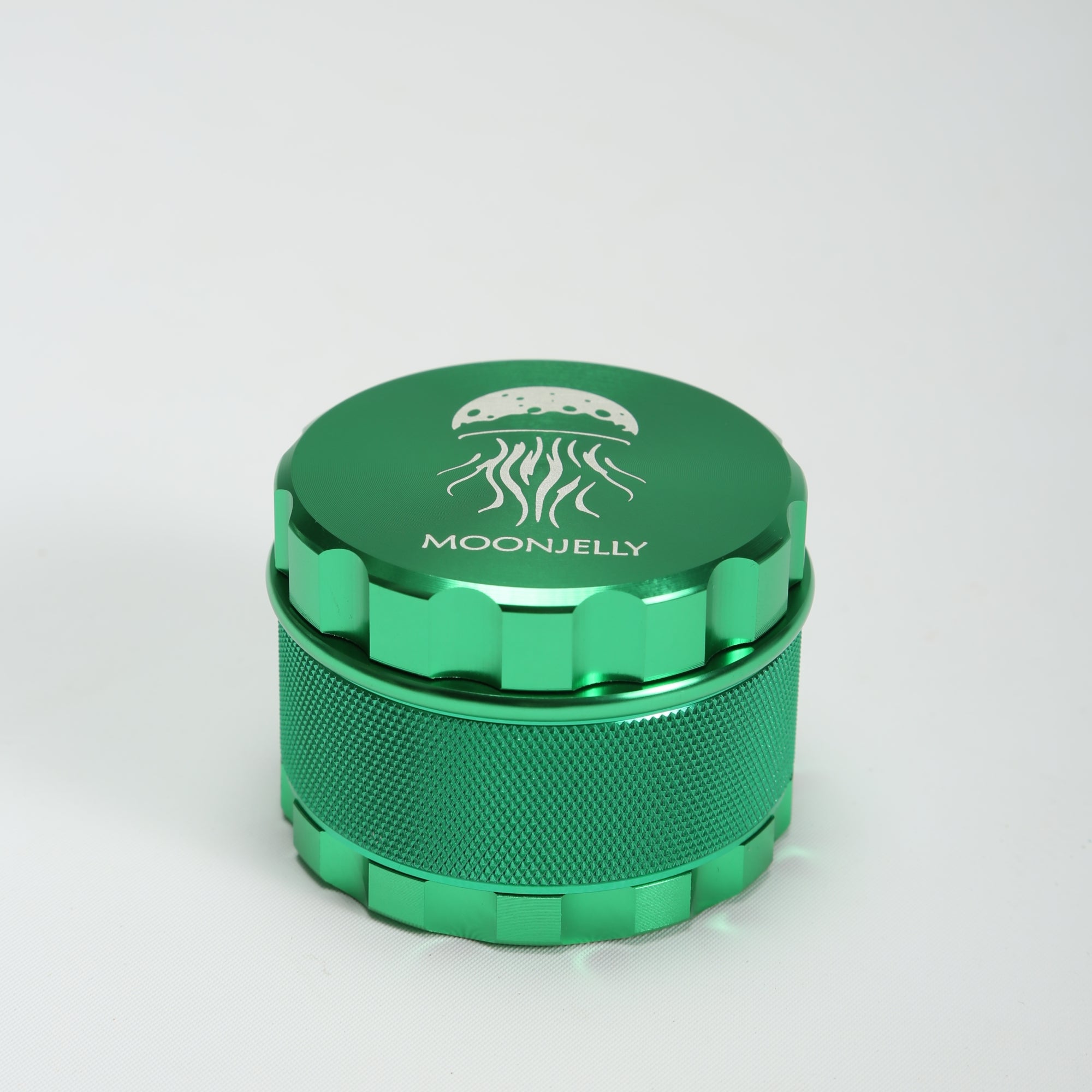 Green metal grinder with &