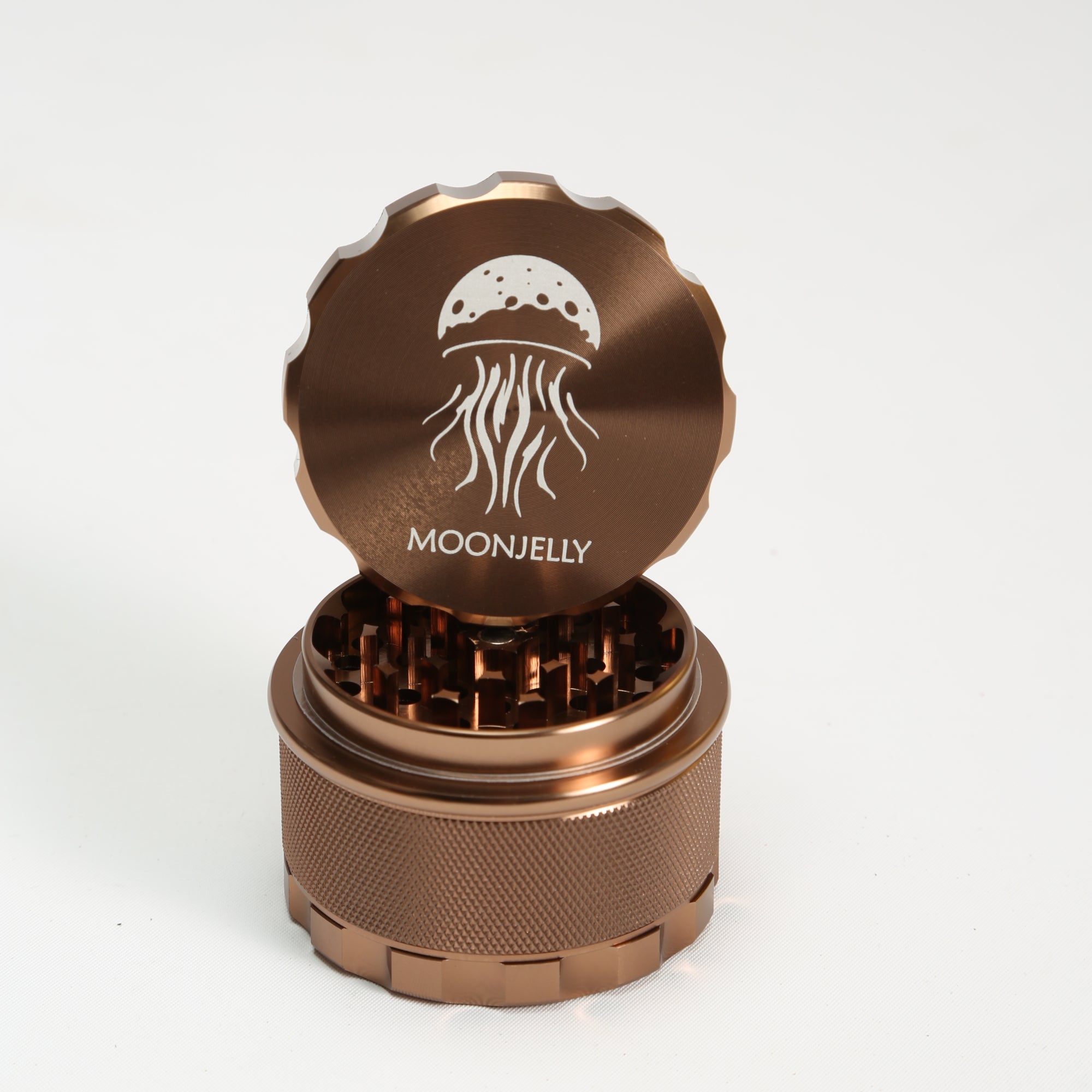 brown herb grinder with &