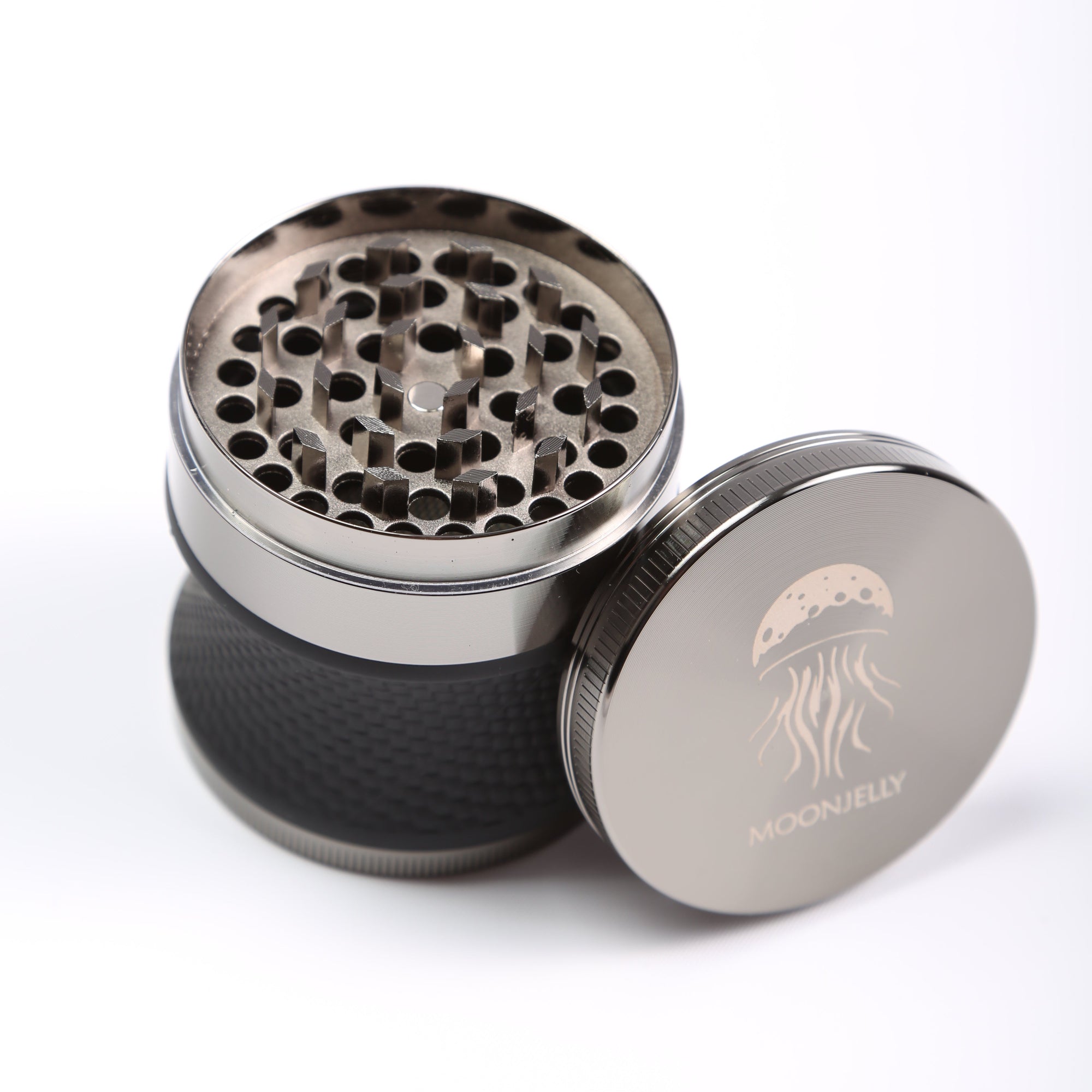 Metallic grinder with brand logo on a white background