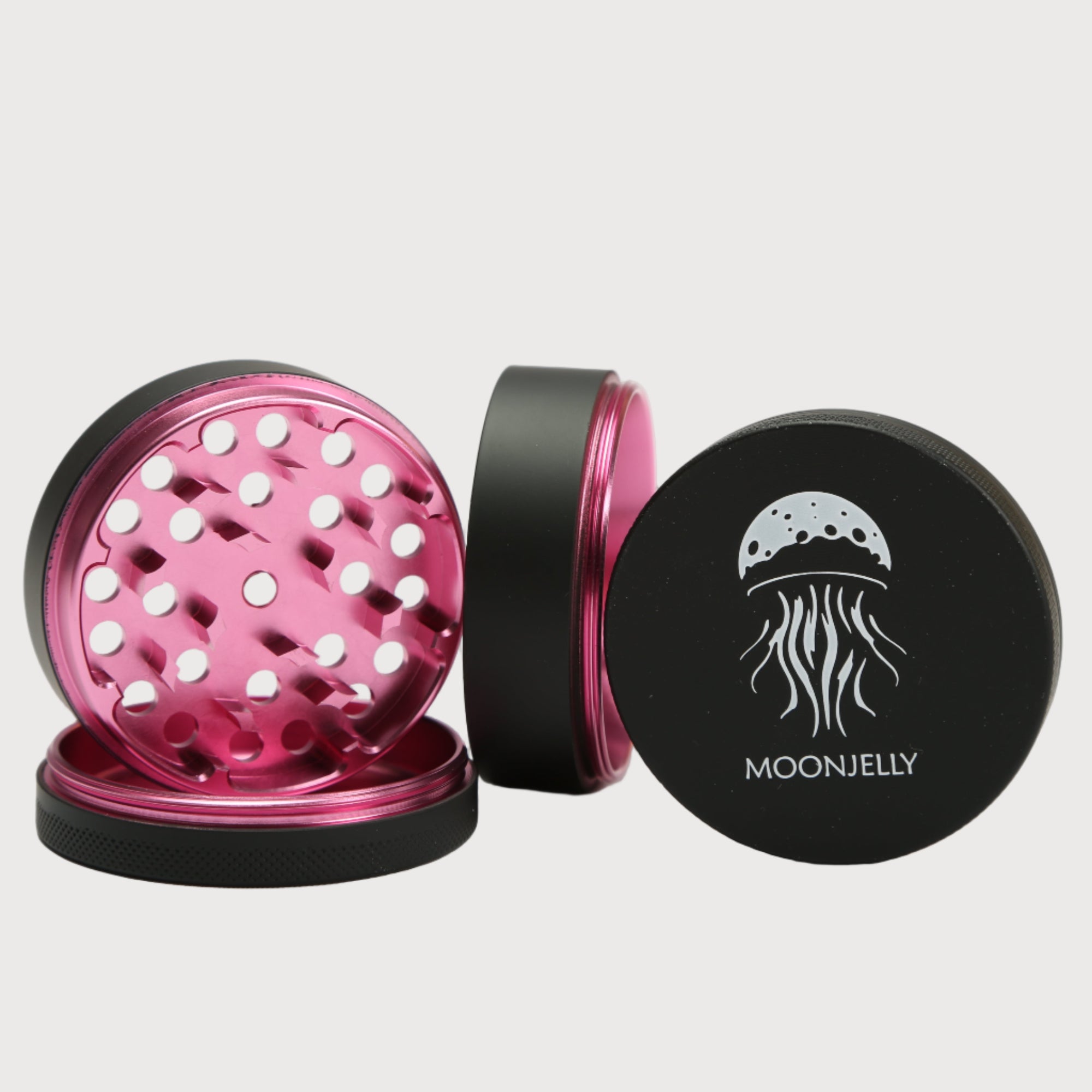 Pink and black grinder with &