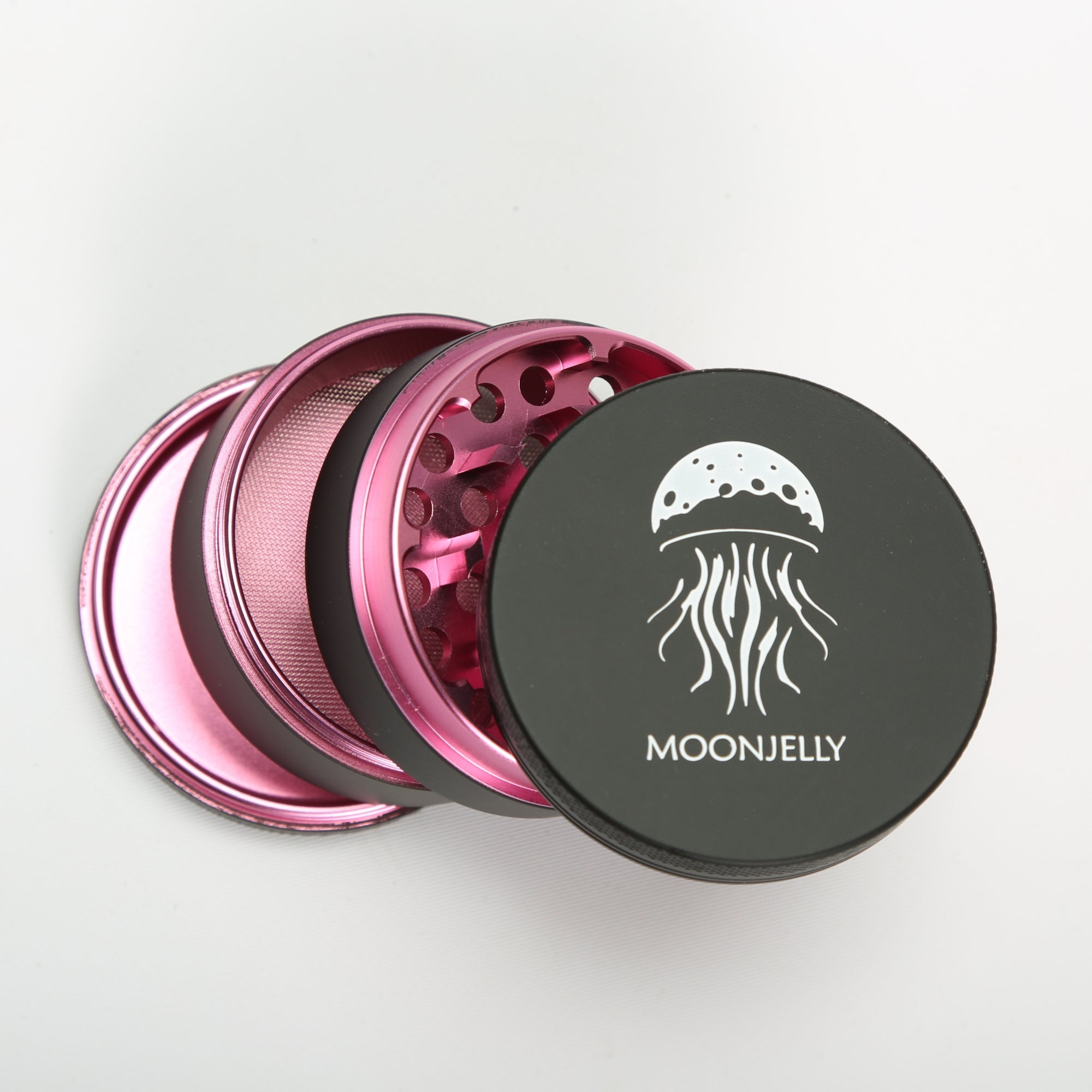 Metallic pink and black grinder with &