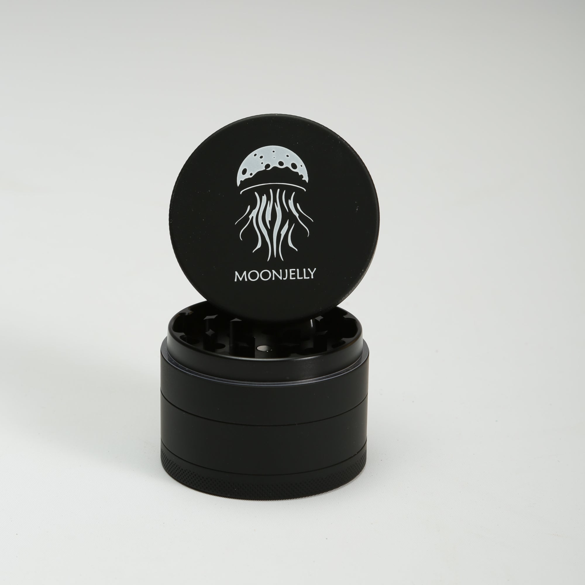 Black grinder with the &