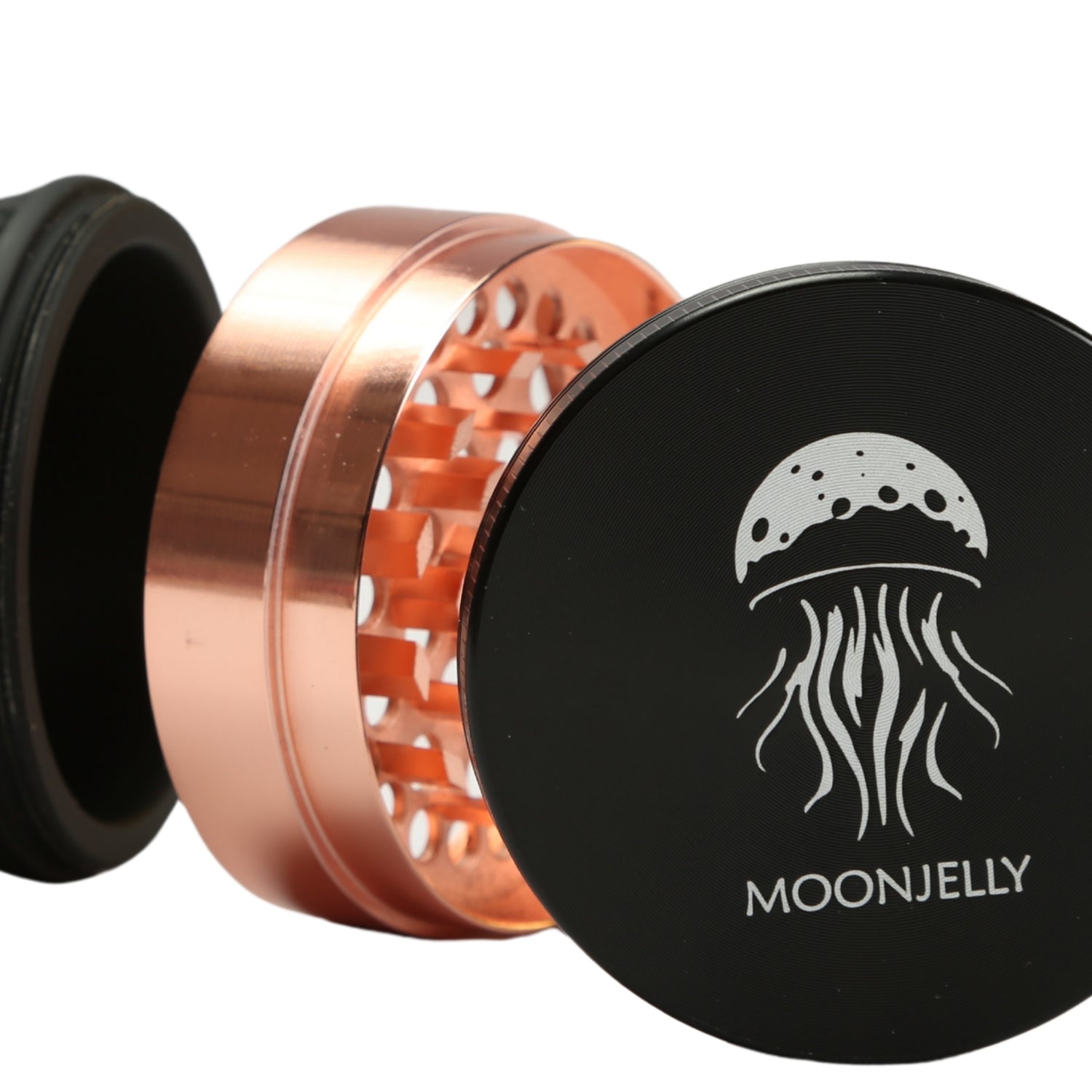 Rose Gold and black grinder with Moonjelly logo on a white background 