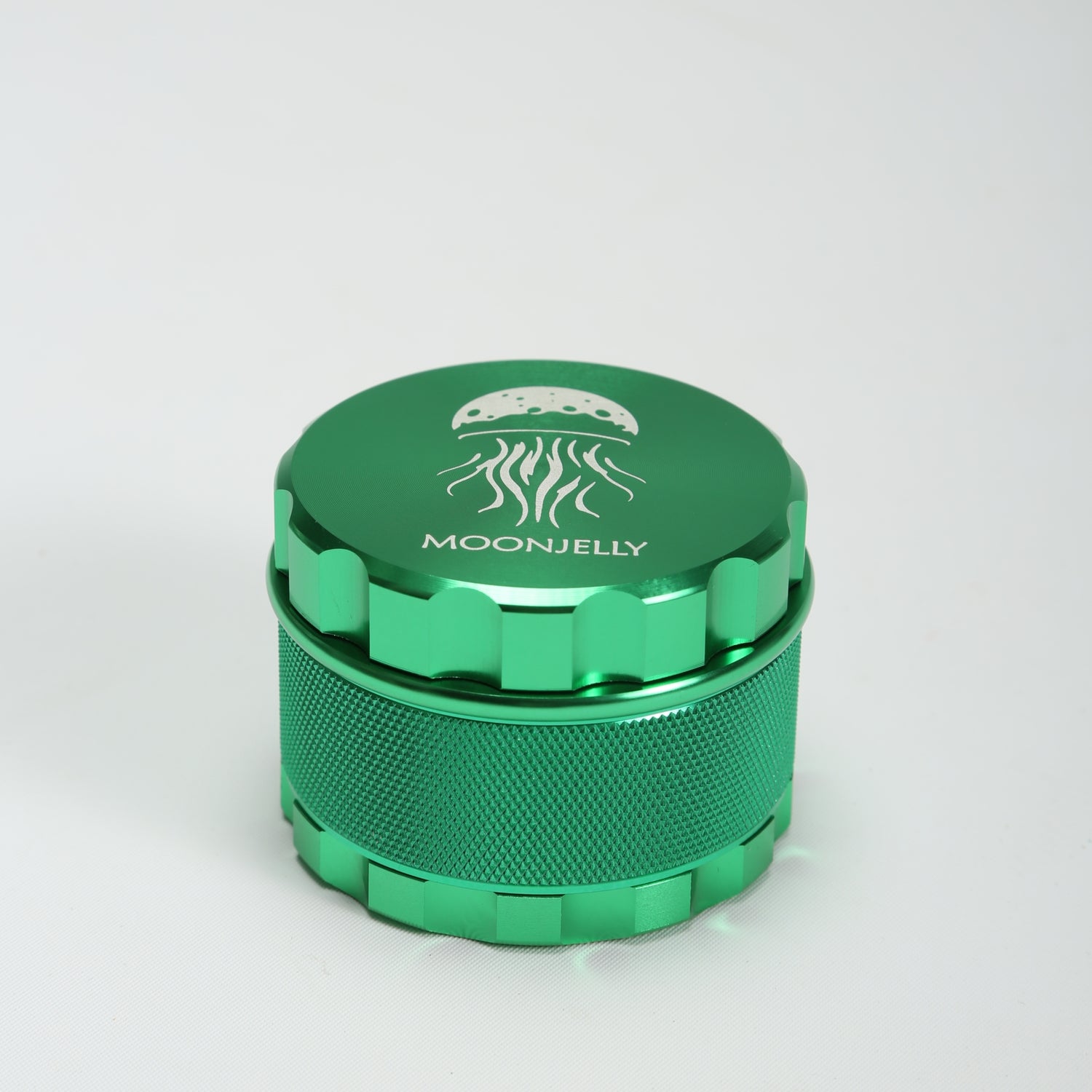 Green metal grinder with &