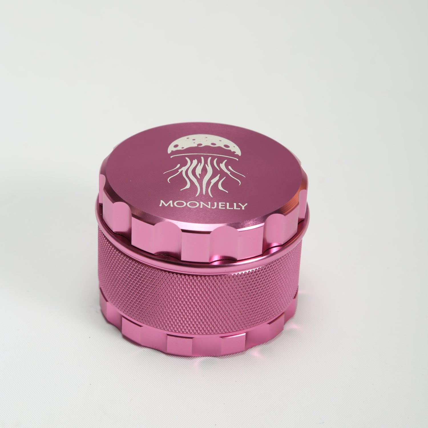 Pink herb grinder with &