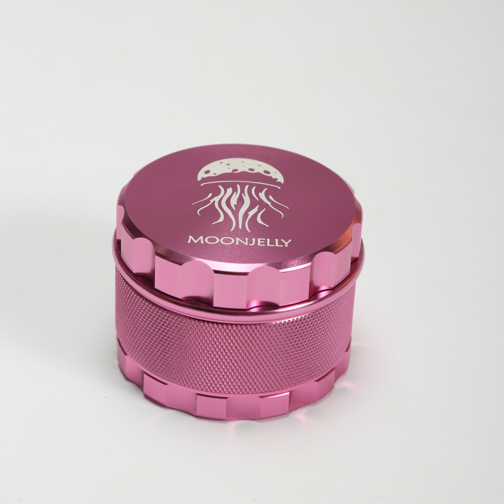 Pink herb grinder with &