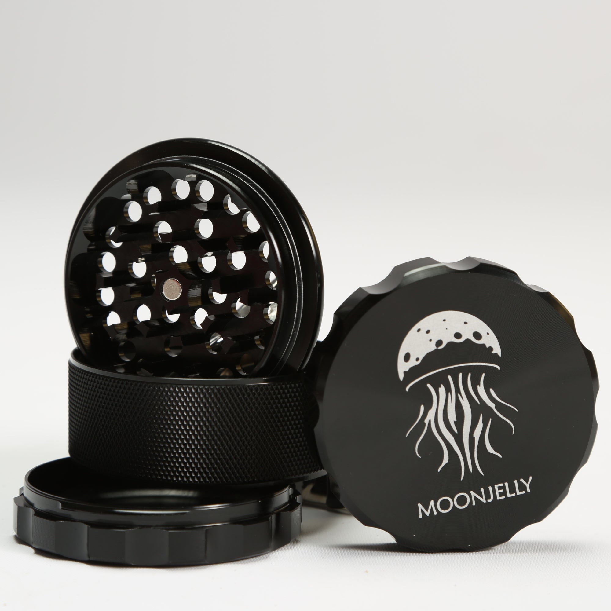 Black herb grinder with &