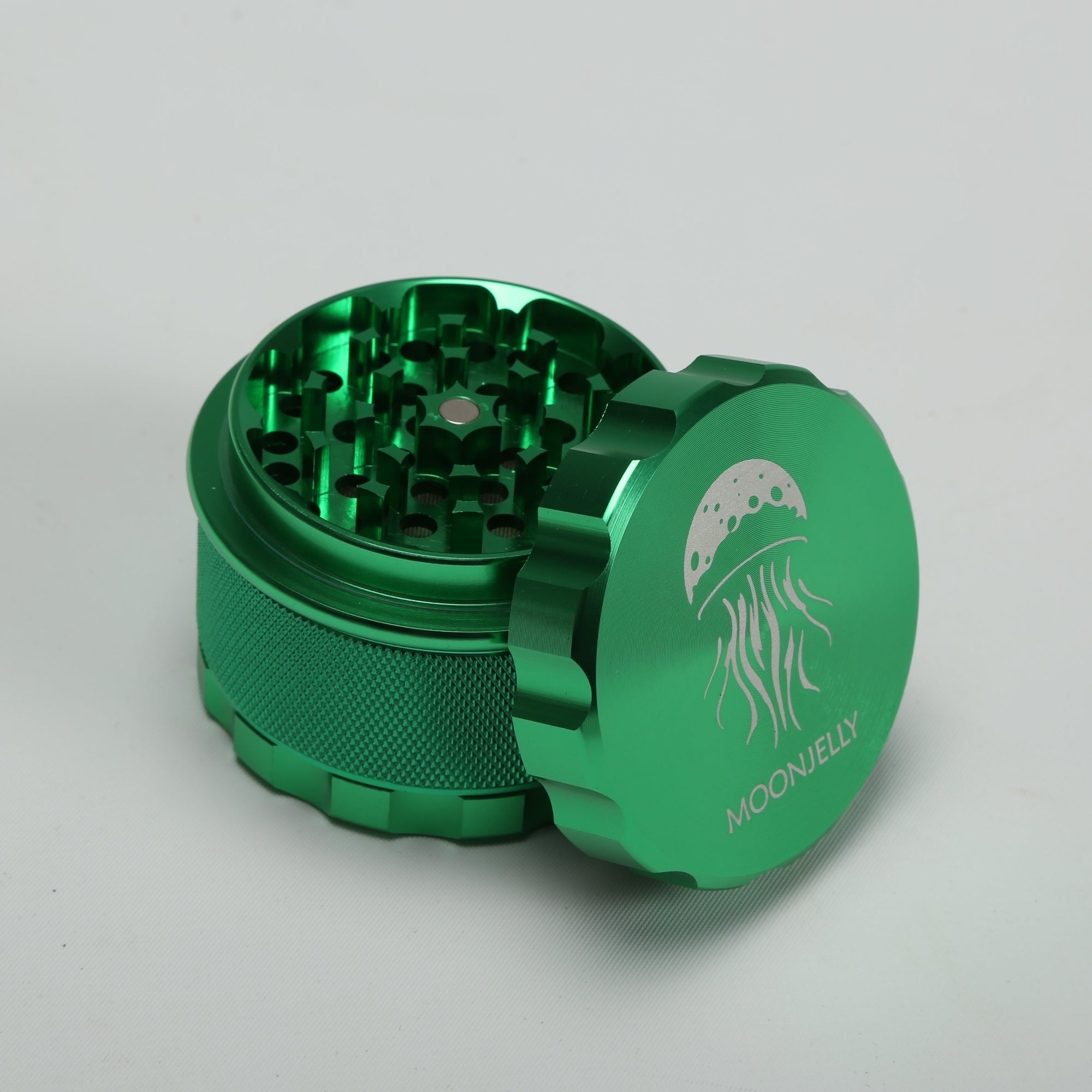 Green metal grinder with &