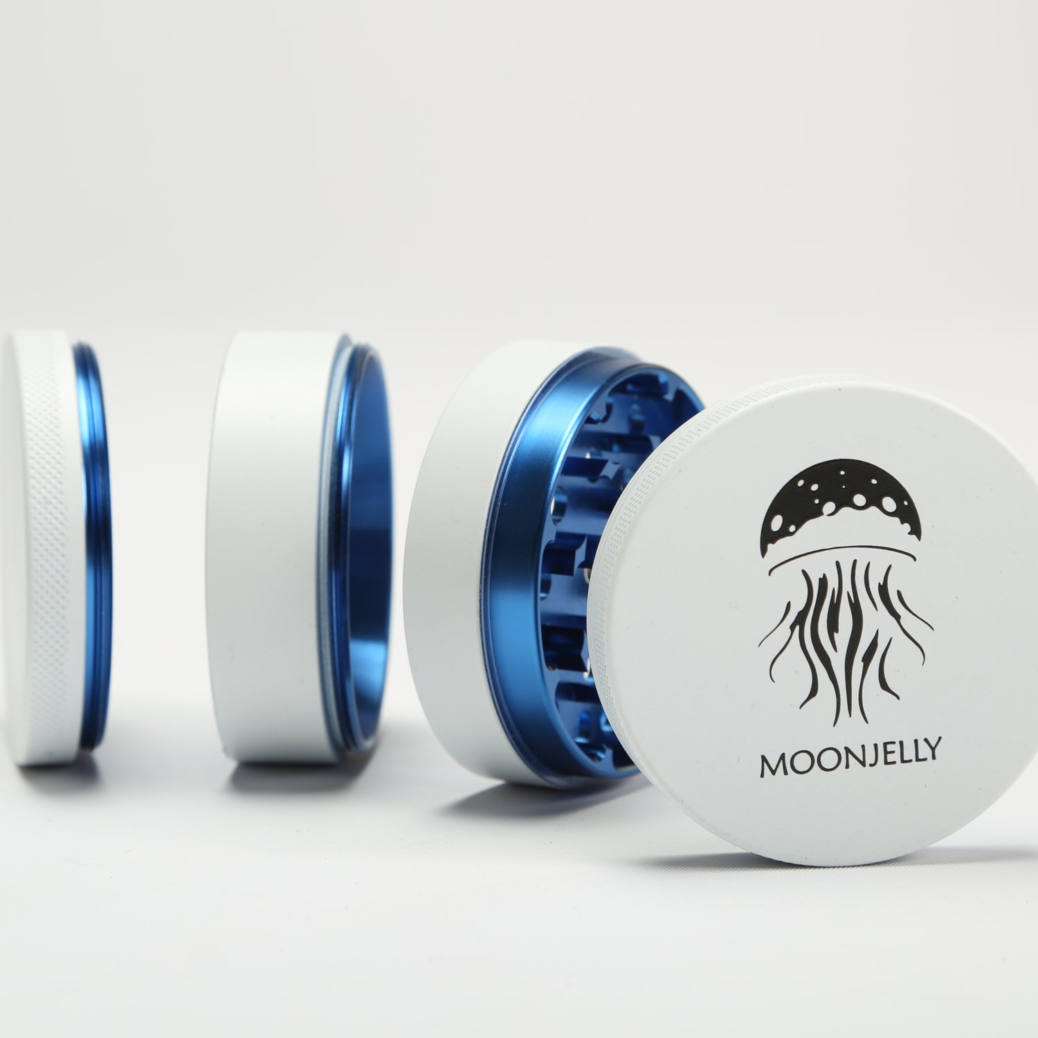 White and blue herb grinder with &