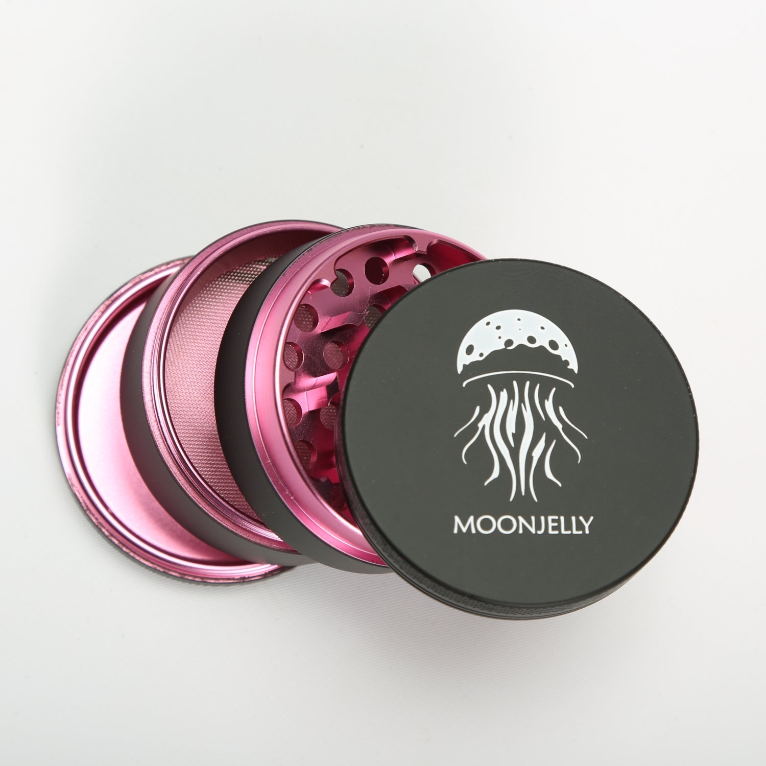 Metallic pink and black grinder with &