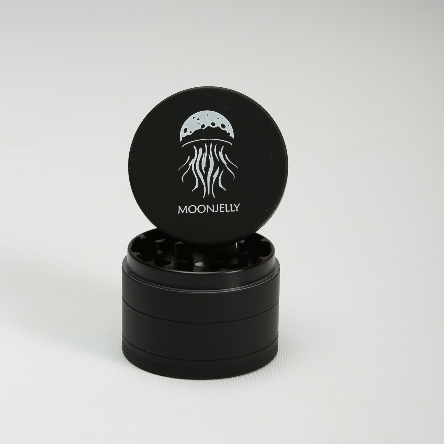 Black grinder with the &